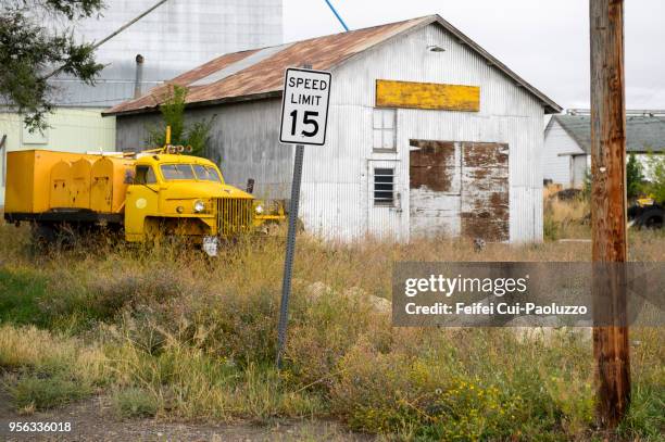 abandoned truck and hangar at three forks, montana, usa - run down stock pictures, royalty-free photos & images