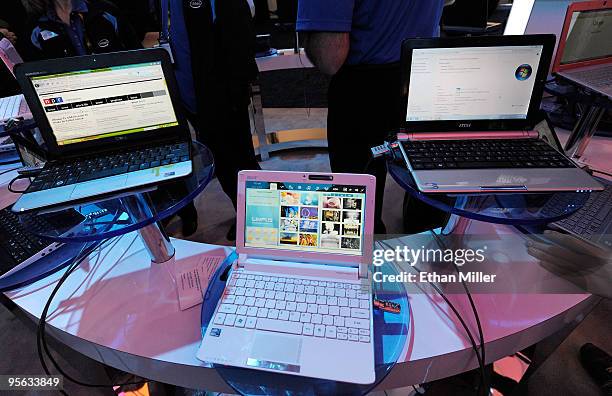 Netbooks running the new Intel N410 Atom processor are displayed at the Intel booth at the 2010 International Consumer Electronics Show at the Las...