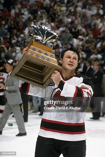 New Jersey Devils Claude Lemieux victorious with Conn Smythe trophy after winning Game 4 and series vs Detroit Red Wings. East Rutherford, NJ...