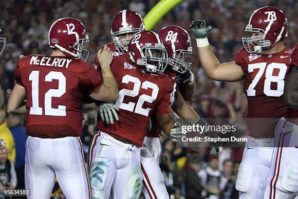 Running back Mark Ingram of the Alabama Crimson Tide celebrates a touchdown against the Texas Longhorns with his teammates in the second quarter of...