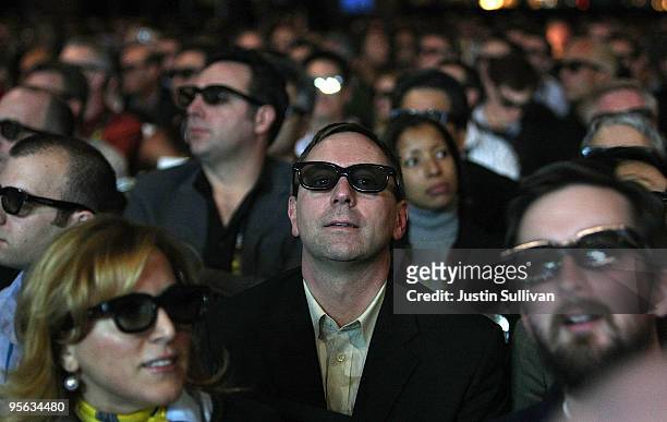 Attendees wear 3-D glasses as they watch a film clip during a keynote by Intel President and CEO Paul Otellini during the 2010 International Consumer...