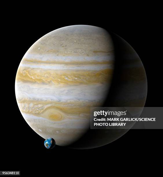 earth compared to jupiter, illustration - jupiter planet stock illustrations