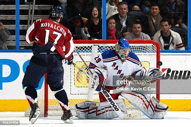 Goaltender Chad Johnson of the New York Rangers saves a shot by Ilya Kovalchuk of the Atlanta Thrashers during a shootout at Philips Arena on January...