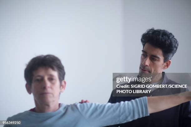 physiotherapy session - sigrid gombert stock pictures, royalty-free photos & images