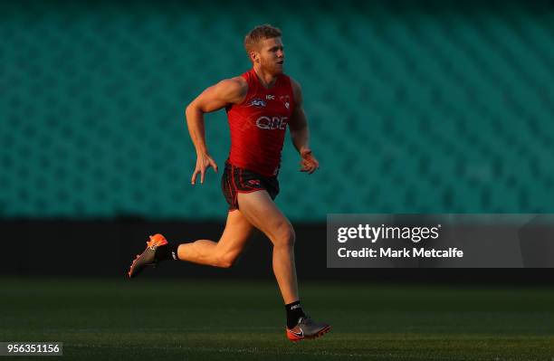 Daniel Hannebery of the Swans runs during a Sydney Swans AFL training session at the Sydney Cricket Ground on May 9, 2018 in Sydney, Australia.