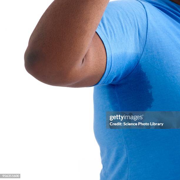 overweight man with sweat patch - body odour stock pictures, royalty-free photos & images