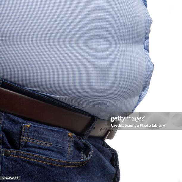 overweight man wearing blue shirt - belly button ストックフォトと画像