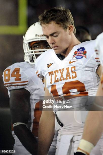 Quarterback Colt McCoy of the Texas Longhorns looks down on the sideline in the third quarter against the Alabama Crimson Tide in the Citi BCS...