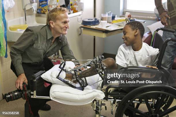 Dr. Edward Fink, from Washington D.C., has a reunion Saturday, Feb. 27, 2010 at Shriners Hospital with his Haitian patient Jean Patrickson who he...