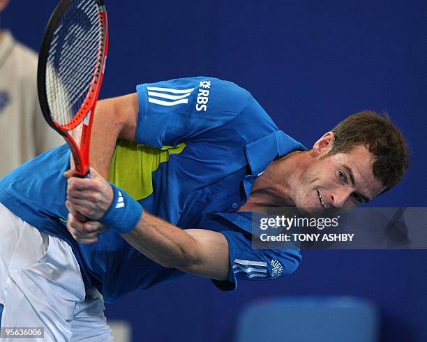Andy Murray of Britain returns against Igor Andreev of Russia during their singles tennis match on the tenth session during day seven of the Hopman...