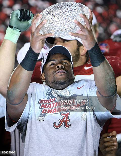 Running back Mark Ingram of the Alabama Crimson Tide celebrates with the BCS Championship trophy after winning the Citi BCS National Championship...