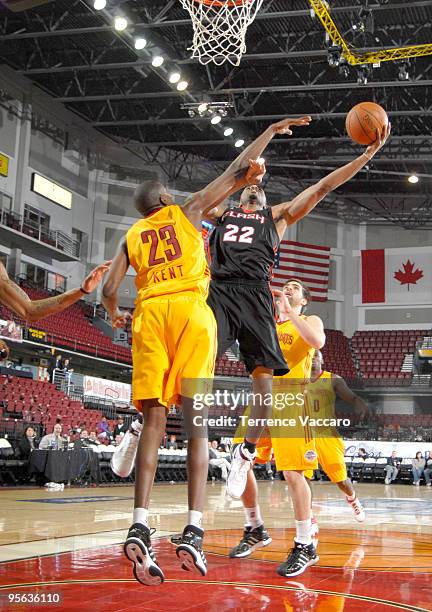 Brian Hamilton of the Utah Flash goes to the basket against Anthony Kent of the Fort Wayne Mad Ants during the 2010 D-League Showcase at Qwest Arena...