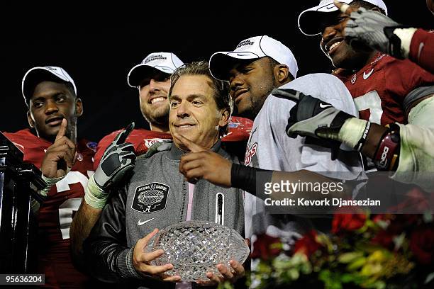 Head coach Nick Saban and the Alabama Crimson Tide celebrate with the BCS Championship trophy after winning the Citi BCS National Championship game...