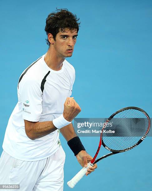 Thomaz Bellucci of Brazil celebrates after winning a point in his quarter-final match against Tomas Berdych of the Czech Republic during day six of...