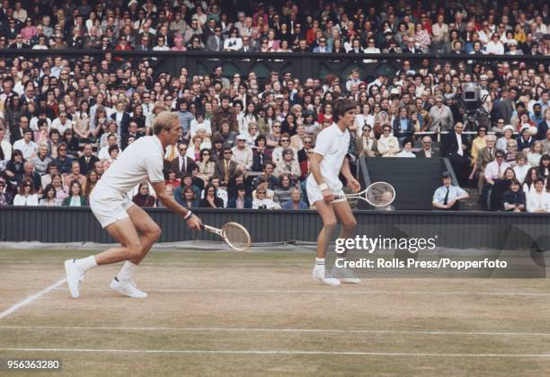 American tennis players Stan Smith and Erik van Dillen pictured in action against Bob Hewitt and Frew McMillan of South Africa in the final of the...