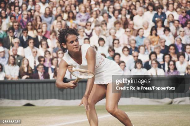 Australian tennis player Evonne Goolagong pictured in action against Chris Evert of the United States in the semifinals of the Ladies' Singles...