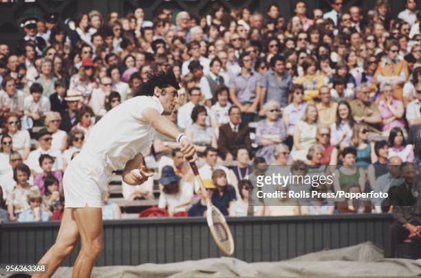 Romanian tennis player Ilie Nastase pictured in action against Manuel Orantes of Spain in the semifinals of the Men's Singles tournament at the...