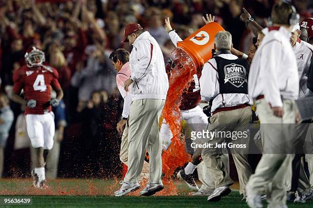Head Coach Nick Saban of the Alabama Crimson Tide ihas gatorade dumped on him during the final moments of the Citi BCS National Championship game...