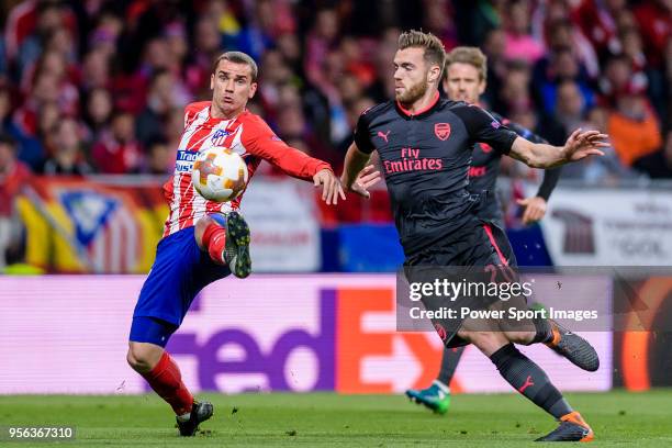 Antoine Griezmann of Atletico de Madrid fights for the ball with Calum Chambers of Arsenal FC during the UEFA Europa League 2017-18 semi-finals match...