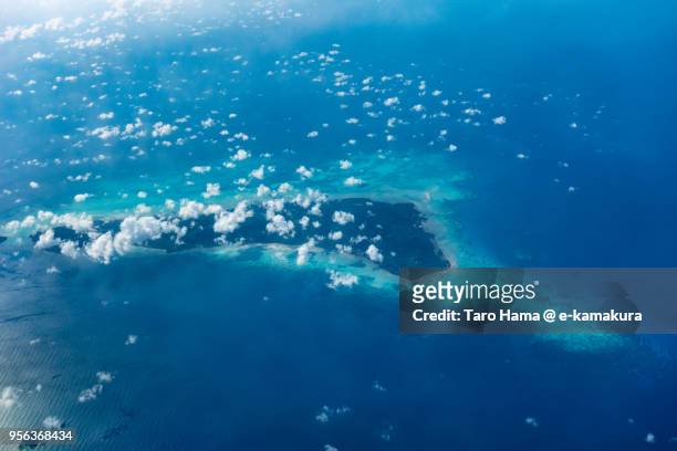 laut island in south china sea in indonesia daytime aerial view from airplane - laut stock pictures, royalty-free photos & images