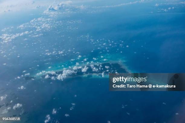 laut island in south china sea in indonesia daytime aerial view from airplane - laut stock pictures, royalty-free photos & images