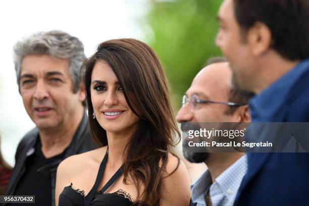 Actor Ricardo Darin, Actress Penelope Cruz, wearing jewels by Atelier Swarovski Fine Jewelry and director Asghar Farhadi attends the photocall for...