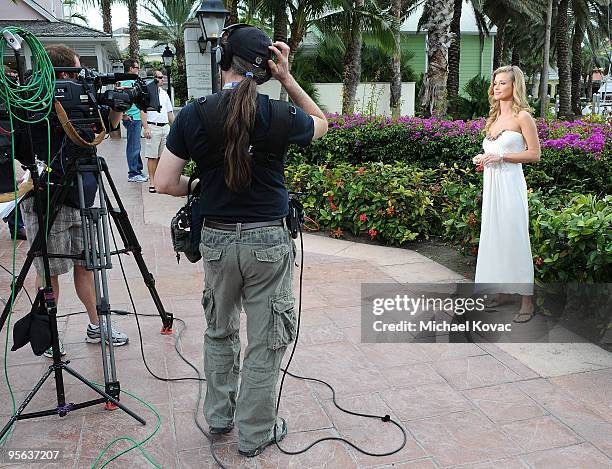 Model/TV personality Joanna Krupa attends a video shoot during a break in the amfAR & Pokerstars Celebrity Charity Poker Tournament at Atlantis...