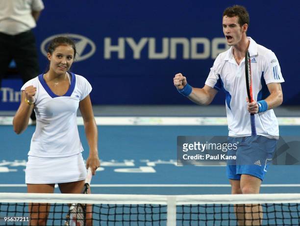 Laura Robson and Andy Murray of Great Britain celebrate a point in their mixed doubles match against Igor Andreev and Elena Dementieva of Russia in...