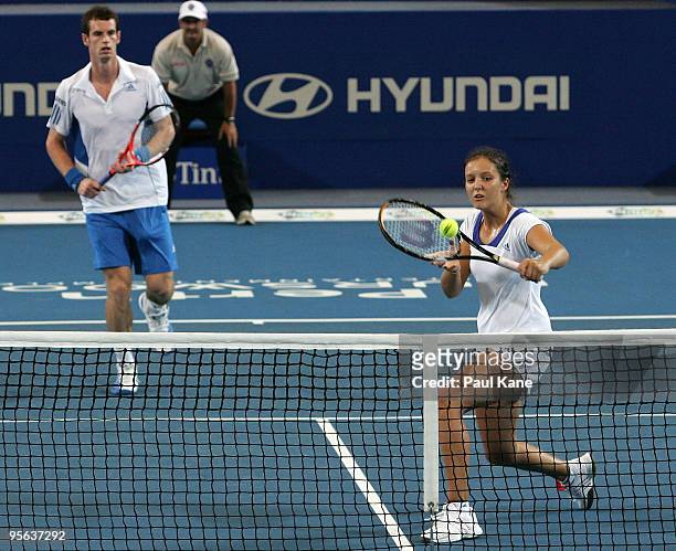 Andy Murray and Laura Robson of Great Britain compete in their mixed doubles match against Igor Andreev and Elena Dementieva of Russia in the Group B...