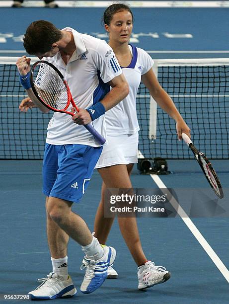 Andy Murray and Laura Robson of Great Britain celebrate a point during their mixed doubles match against Igor Andreev and Elena Dementieva of Russia...