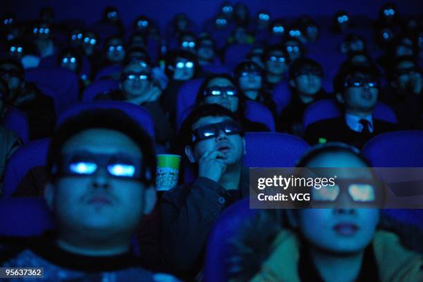 The Audience watch the 3D film 'Avatar' through 3D glasses at a cinema on January 7, 2009 in Taiyuan, Shanxi province of China.