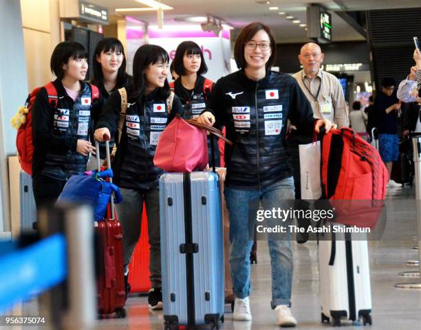 Kasumi Ishikawa and Japan Women's table tennis team members are seen on arrival at Narita International Airport on May 8, 2018 in Narita, Chiba,...