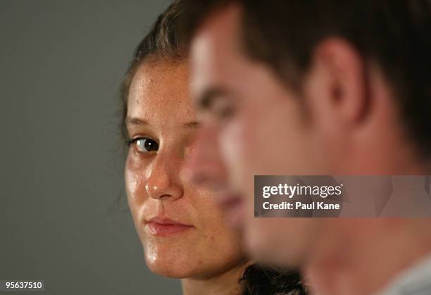 Laura Robson of Great Britain looks at Andy Murray during a press conference after the mixed doubles Group B match between Great Britain and Russia...