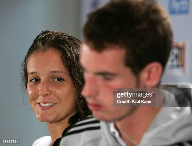 Laura Robson of Great Britain looks at Andy Murray during a press conference after the mixed doubles Group B match between Great Britain and Russia...