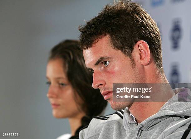Laura Robson and Andy Murray of Great Britain look on during a press conference after the mixed doubles Group B match between Great Britain and...