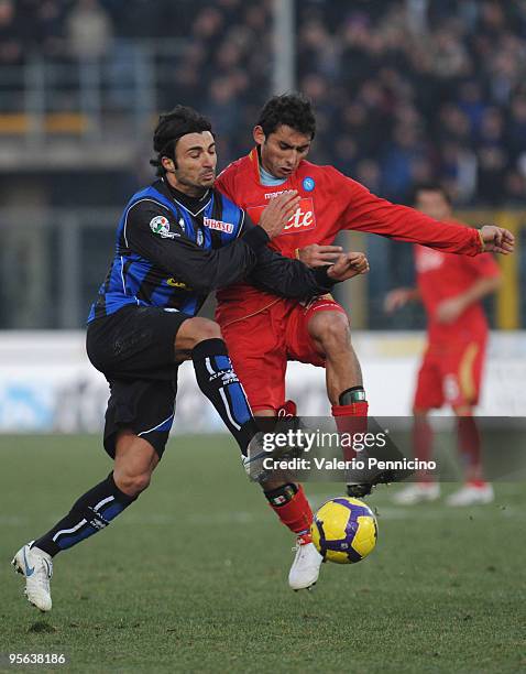 Fabio Ceravolo of Atalanta BC competes for the ball with Michele Pazienza of SSC Napoli during the Serie A match between Atalanta BC and SSC Napoli...