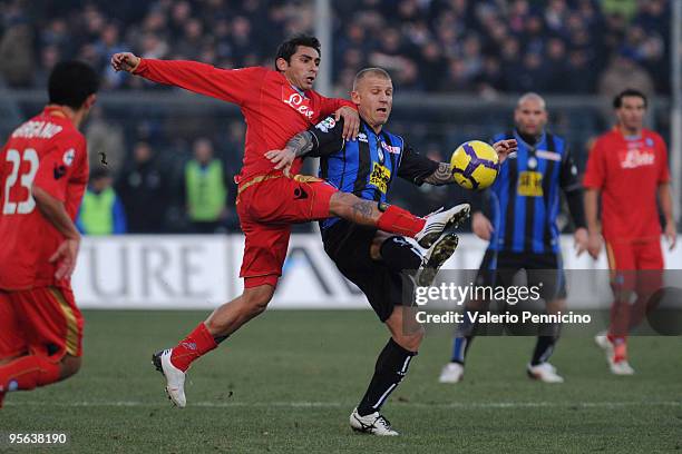 Diego De Ascentis of Atalanta BC competes for the ball with Michele Pazienza of SSC Napoli during the Serie A match between Atalanta BC and SSC...