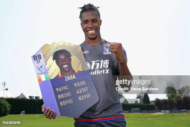 Wilfried Zaha of Crystal Palace is awarded with the EA SPORTS Player of the Month for April on May 8, 2018 in Beckenham, England.