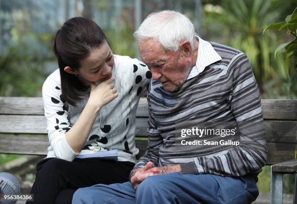 Australian botanist and academic David Goodall, who is 104 years old, chats with Taiwanese actress and television hostess Bowie Tsang, who was...