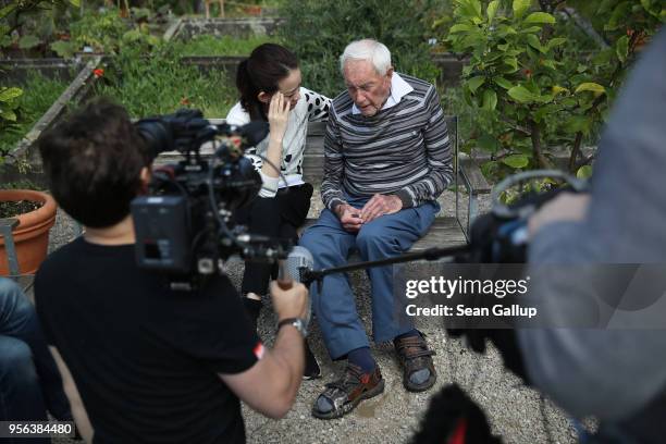 Australian botanist and academic David Goodall, who is 104 years old, chats with Taiwanese actress and television hostess Bowie Tsang during the...