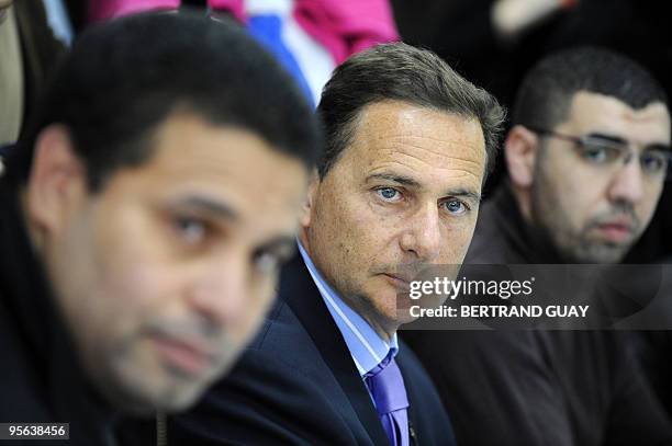 France's minister for immigration and national identity Eric Besson attends a debate on national identity with local associations representatives on...