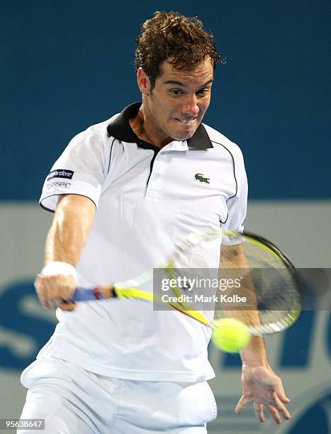 Richard Gasquet of France plays a backhand in his quarter-final match against Andy Roddick of the USA during day six of the Brisbane International...