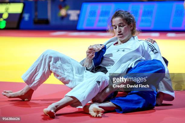 Nelson Levy of Israel holds Jovana Rogic of Serbia eventually winning the u57kg match by a wazari during day one of the 2018 Tel Aviv European Judo...
