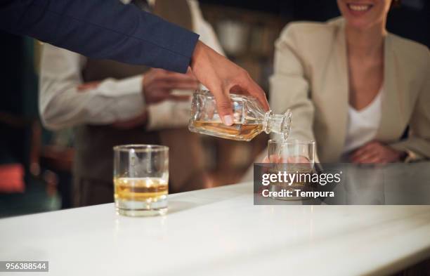 business retreats, drinking in the bar, happy hour. - country club woman stock pictures, royalty-free photos & images