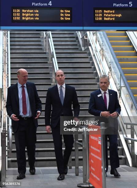 British Transport Secretary Chris Grayling, Prince William, The Duke of Cambridge and Mark Carne, Chief Executive of Network Rail at London Bridge...