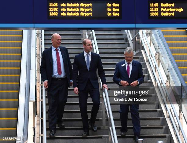 British Transport Secretary Chris Grayling, Prince William, The Duke of Cambridge and Mark Carne, Chief Executive of Network Rail at London Bridge...