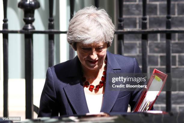 Theresa May, U.K. Prime minister, departs number 10 Downing Street to attend a weekly questions and answers session in Parliament in London, U.K., on...