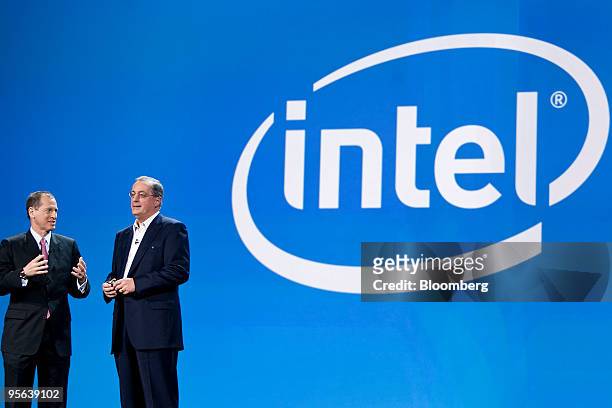 Gary Shapiro, chief executive officer of the Consumer Electronics Association , left, speaks with Paul Otellini, Intel's chief executive officer,...