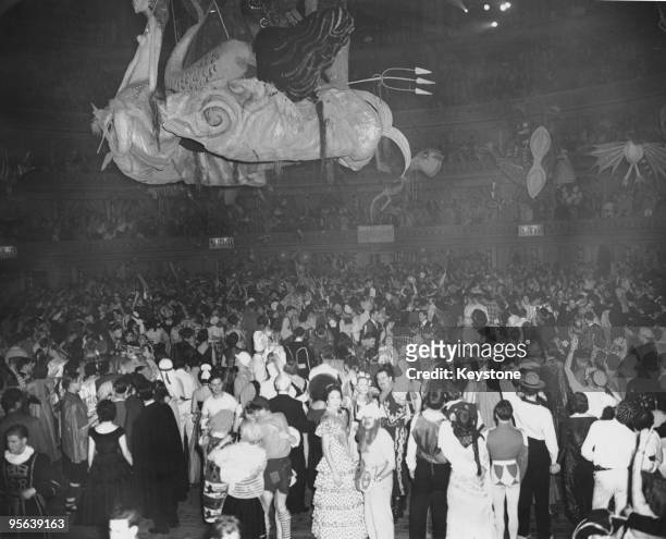 The Chelsea Arts Ball on New Year's Eve at the Albert Hall in London, 31st December 1954. The theme of the ball was 'The Seven Seas' and a large...