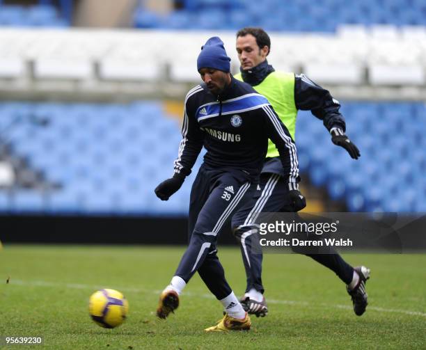 Nicolas Anelka and Ricardo Carvalho of Chelsea during a training session at Stamford Bridge on January 8, 2010 in London, England.